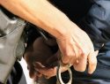 Figueroa being handcuffed at scene