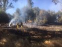 Firefighters work Finnegan Fire in Angels Camp caused by illegal firework July 3 2018