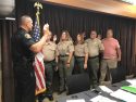 Sheriff Dibasilio administers oath to Terry Bullock, Kathy Martin, Jan Jakubek, Bob Barron and Jim Currier