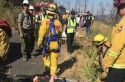 Rescue crews after pulling victim from the vehicle