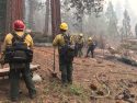 Donnell Fire engine crew extinguishing hot spots