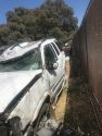 Smashed up GMC Yukon after being pulled up from the ravine