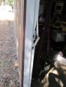 Door damaged in burglary