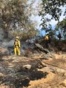 Vegetation fire behind a Soulsbyville home