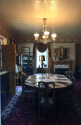 Utica Mansion in the dining room full of artifacts