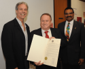 Dr. Rod Harris receives resolution on his jazz studies program 40th anniversary from Tuolumne County Supervisor-Chair John Gray with Columbia College President Dr. Santanu Bandyopadhyay