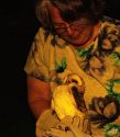 Rescue volunteer Laura holding Barny for the last time