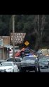 Tow truck pulling pickup out of creek on Stockton Road