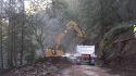 Clearing rock slide on HWY 26 east of Glencoe