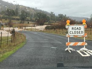 Flood waters on Sims Road in Chinses Camp area