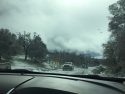 Hwy 4 with snow and slush and PGE truck caravan approaching Feb 5 2019