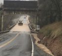 Removing mud and water from Highway 49 in Calaveras County