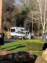 Damaged truck in hit-and-run on Mill Villa Road