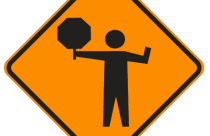 Traffic control flagger sign