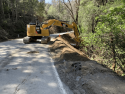 Caltrans CAT operator addressing Hwy 26 repair work finishing touches along stretch closed by Feb. 14 2019 winter storm damage