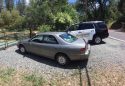 Stolen car left near woods on Parrotts Ferry Road