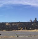 Eastbound 108 Mono Way offramp grass fire