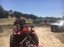 Tractor mowing dry grass ignites fire