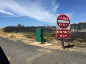Eastbound 108 Mono Way offramp grass fire