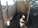Shallow hole for human waste at Tree Lane in West Point