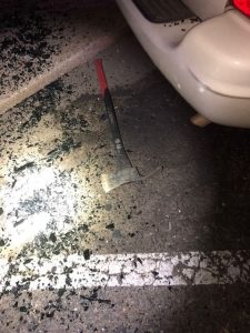 Driver Uses Ax On Broken Down Vehicle