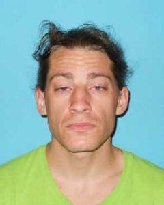 Gun Fire Results In Arrest