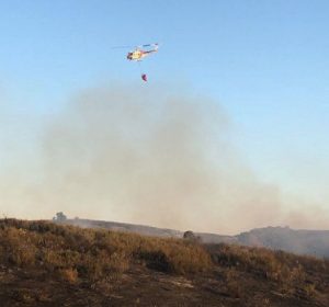 The Whiskey Fire burning at New Hogan Lake in Calaveras County