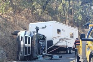 Truck rolls over on HWY 49 blocking roadway