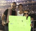 Megan, Jeremy -- a eadringer for Eric Church -- Makena Wallace and her sign Sept 29 2019