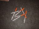 Hypodermic needles found on theft suspects