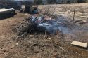 Burn pile that escaped and ignited a half acre fire