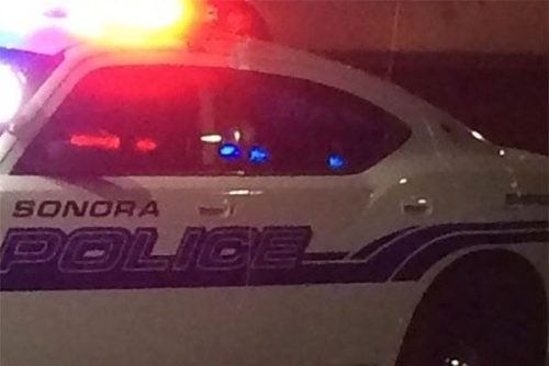 Sonora police patrol car at night