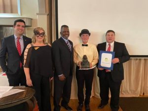 Calaveras County Chamber of Commerce and Dr. Randy Smart after receiving its Golden Frog Award.