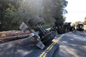 Over turned big rig logging truck on HWY 49 blocking the highway