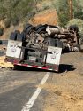 Overturned semi that spilled its load of lumber on O'Byrnes Ferry Road