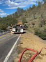 Overturned semi that spilled its load of lumber on O'Byrnes Ferry Road