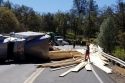 Overturned semi that spilled its load of lumber on O'Byrnes Ferry Road