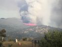CAL Fire tanker 83 dropping retardant