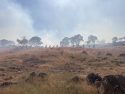 Cite CAL FIRE TCU please, A Baseline Crew makes access to the left flank of the fire.
