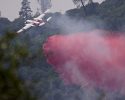 Columbia air tanker 83 dropping retardant on the fire off West Stockton Road