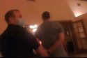 Glow of red retardant from extinguisher in air during arrest at the Sonora Inns