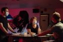 Producer Lydia Cedrone (C)- Writer-Director Justin LaReau (R) and Andres Moret Urdampilleta on set at Steve's Place.