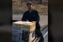 Jake Fuller of Mother Lode Tree Service donating a new generator to Meals On Wheels
