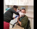 Dr. Eric Sergienko Receives COVID-19 Vaccine