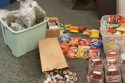 Drug items seized including colorful packaging and in vape pens
