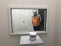 Holding cell with glass window for prisoners to talk privately with lawyers