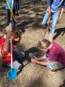 Students of Pinecrest Expedition Academy measuring PH levels of soil in preparation of planting