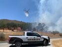 Fire ignited by stolen car involved in chase