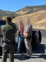 Suspect in handcuffs after the high-speed chase in Mariposa County