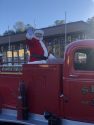 Santa waves to the crowd